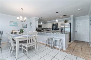 Dining area to kitchen bar area