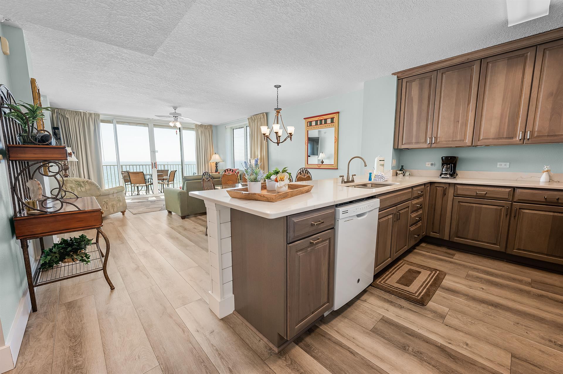 Kitchen view to dining and living room