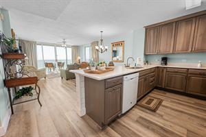 Kitchen view to dining and living room