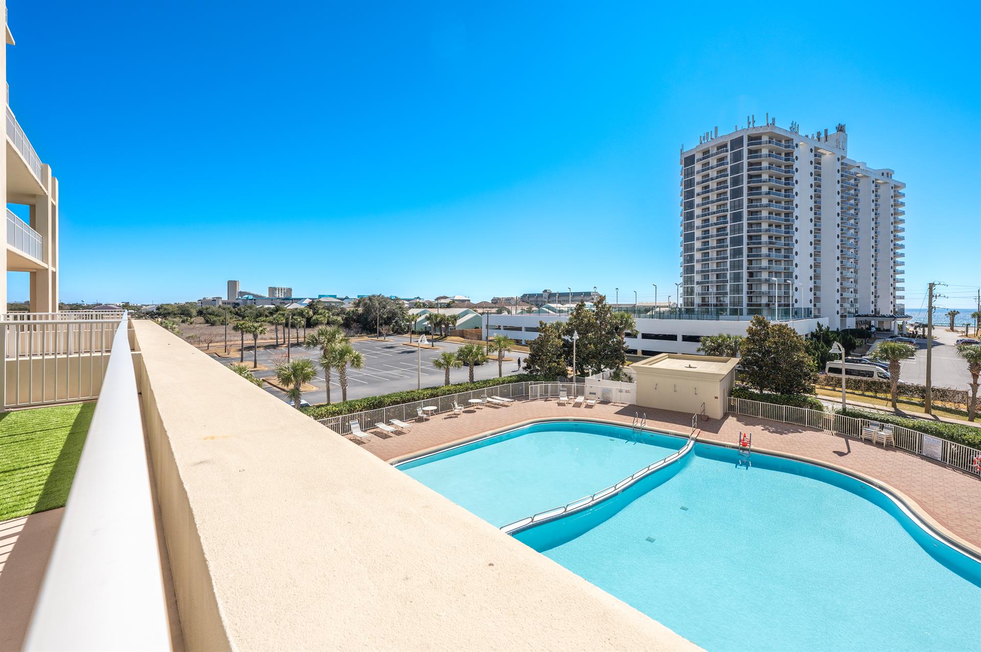 Balcony overlooking pool