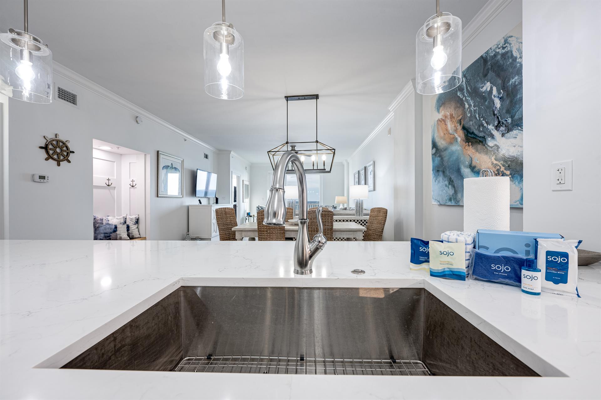 Kitchen view to dining and living areas