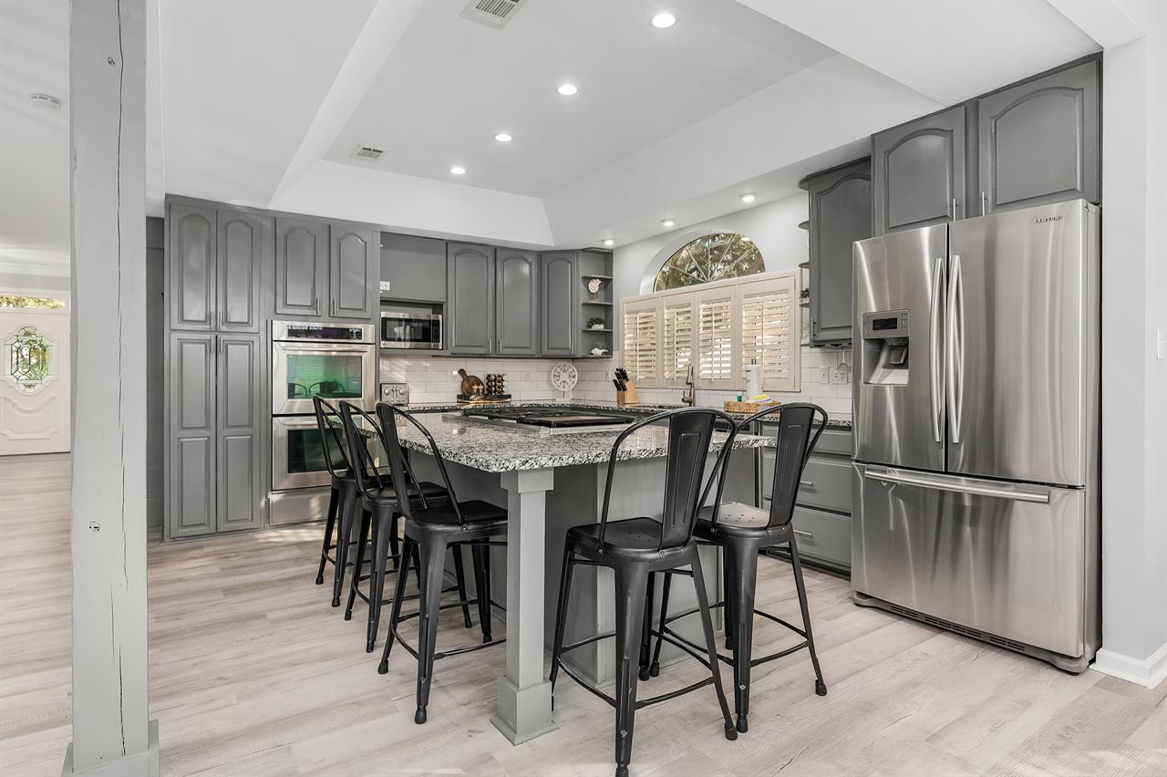Kitchen area with breakfast bar