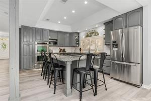 Kitchen area with breakfast bar