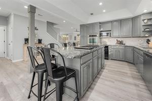 Kitchen area with breakfast bar