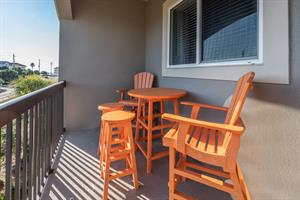 Private balcony overlooking beach road