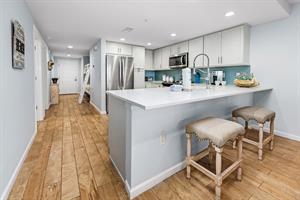 Kitchen area with breakfast bar