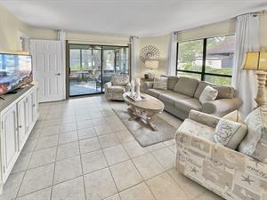 Living area with entrance to back patio