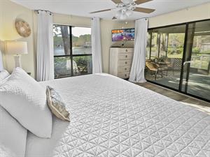 Master bedroom with access to back patio