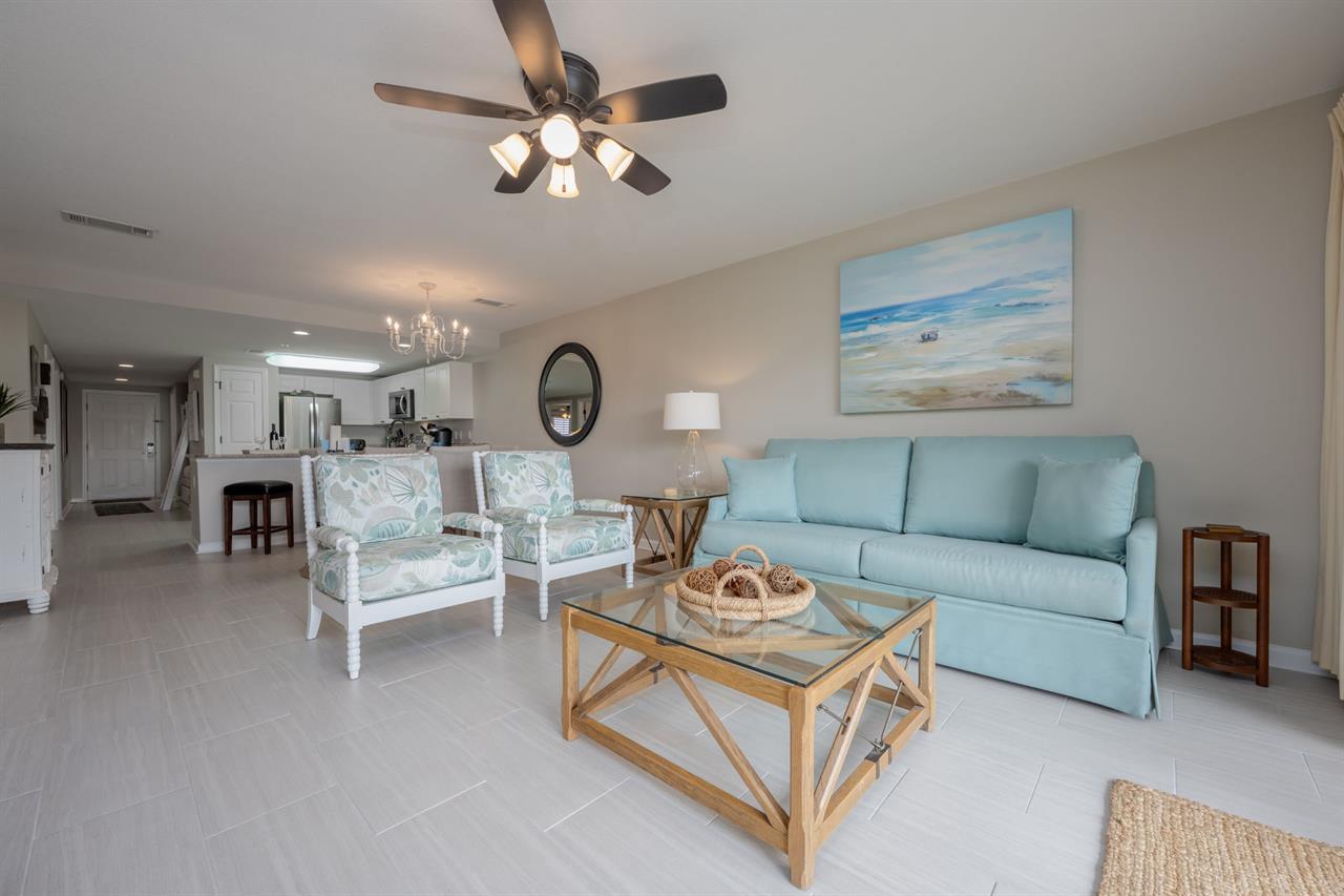 Coastal Amalfi-inspired living room with azure blue and white