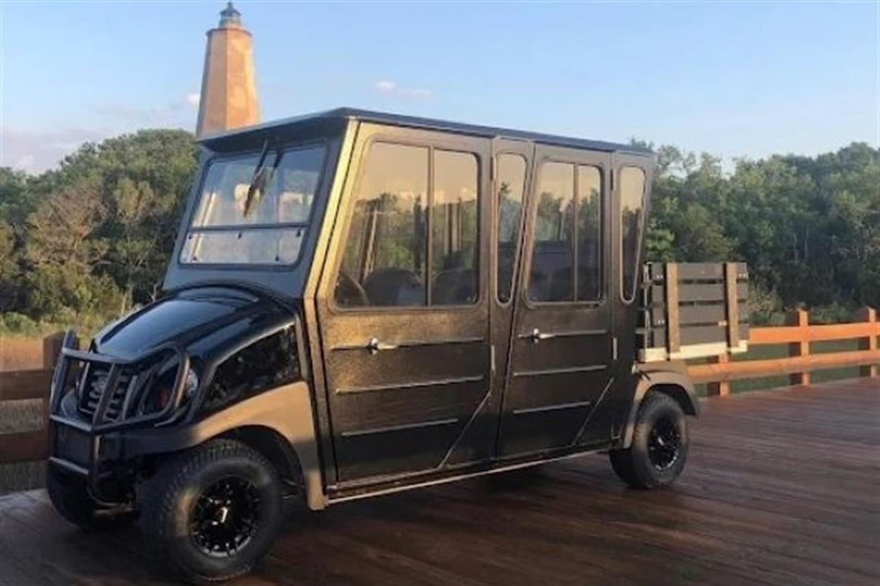 Cary Cart Co golf cart on bridge