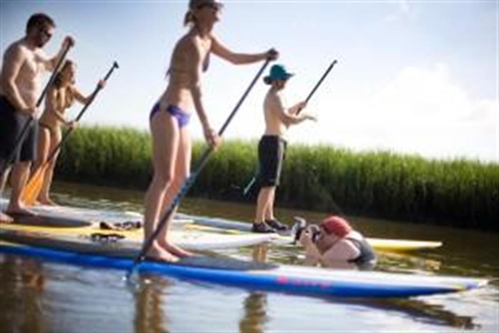 Millie gets wet trying for that perfect SUP shot.