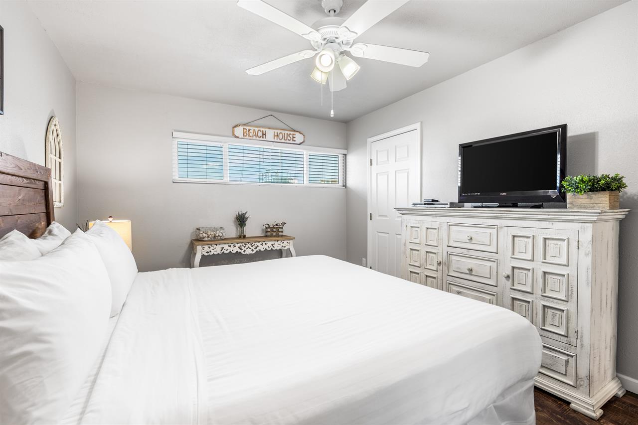 HSRC 114 Master Bedroom with King Bed  32 TV