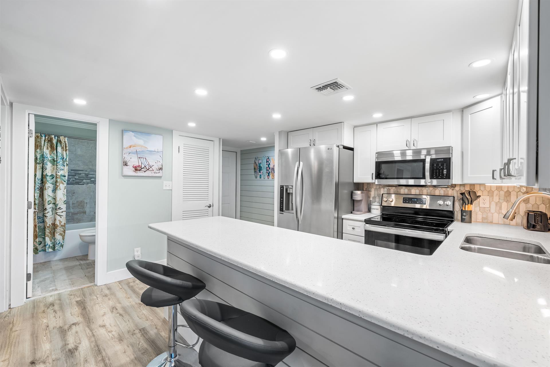 Kitchen And Door To Second Bathroom