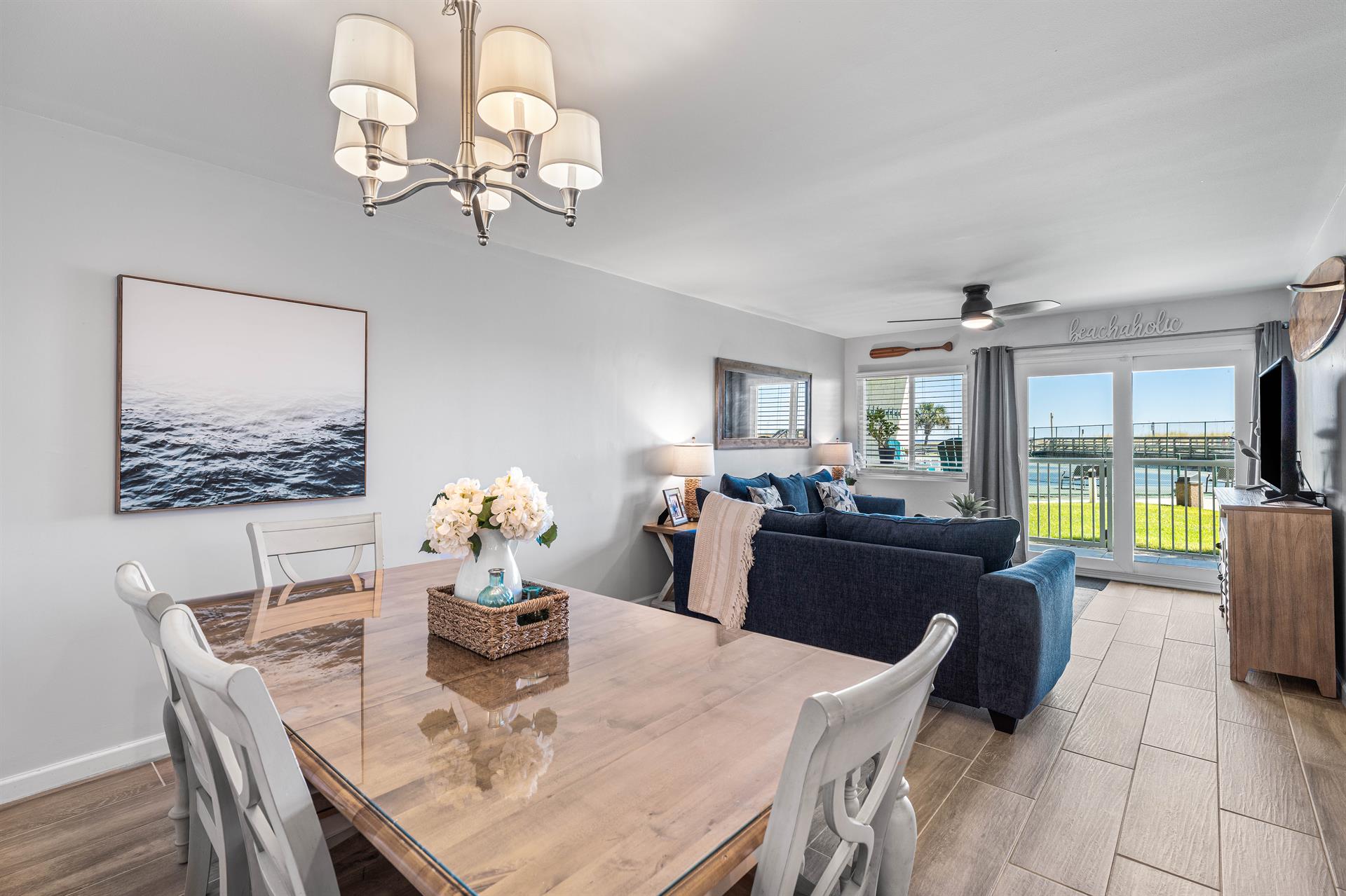 Dine together at the table with seating for six.