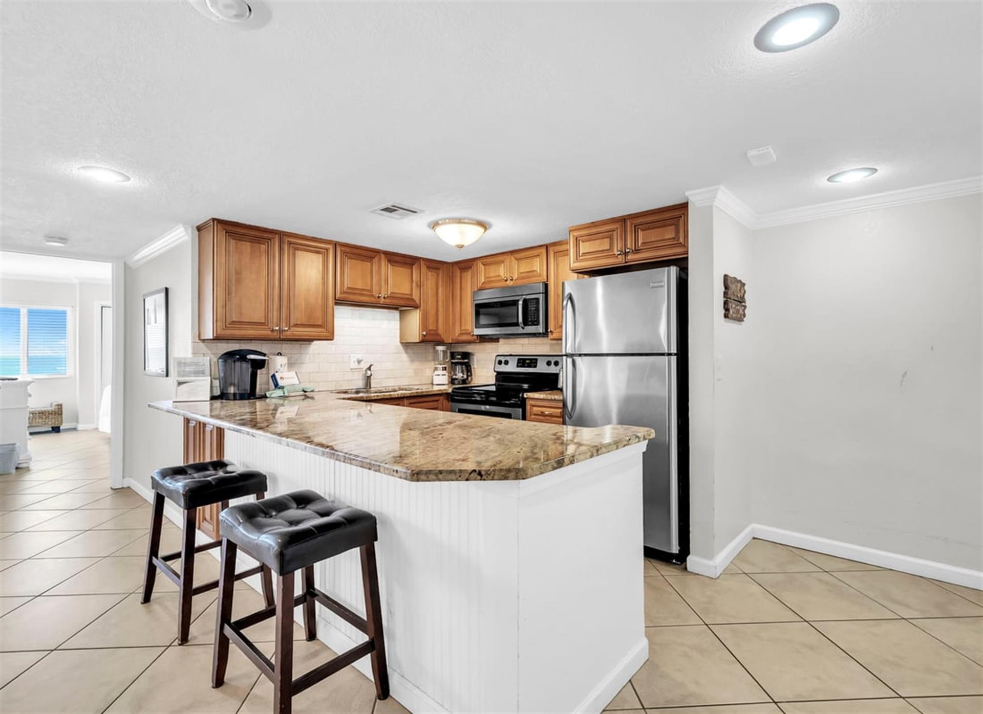 Kitchen, Breakfast Bar and Master Bedroom