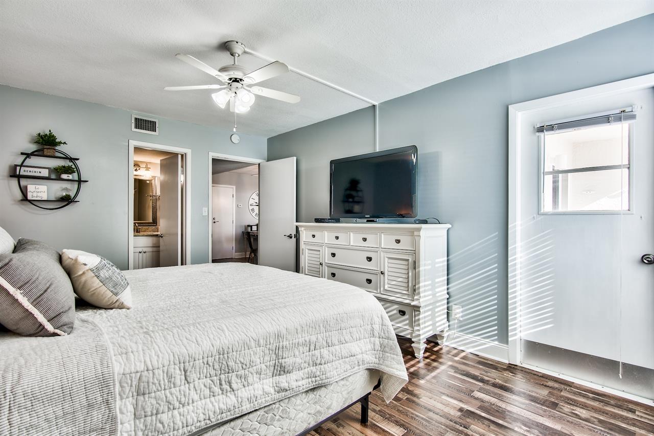 HSRC 211 Master Bedroom with King Bed, 46 TV  Balcony Access