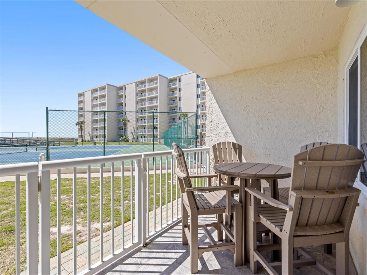 Private WalkOut Patio With The Tennis Court View