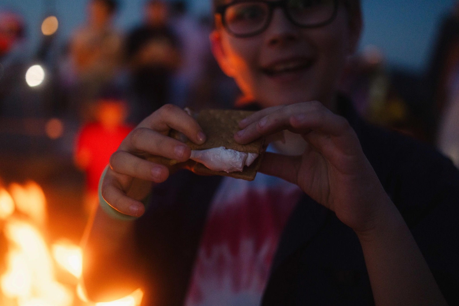 A beach bonfire at the water&rsquo;s edge at Cinnamon Shore
