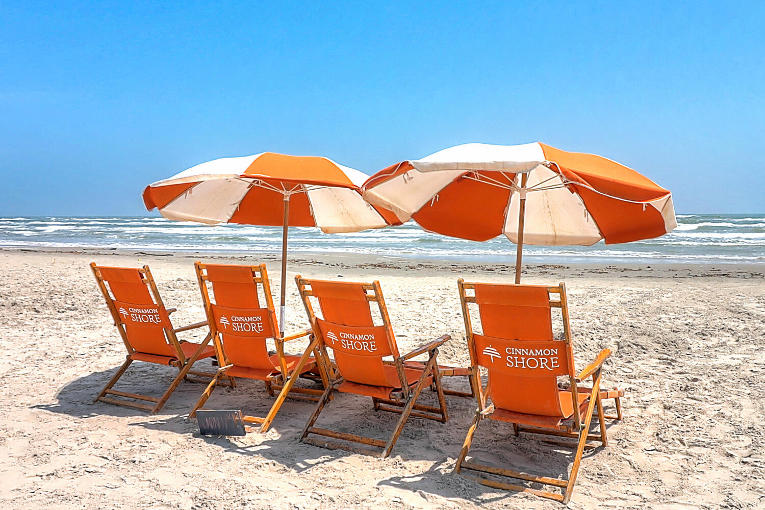 beach chairs umbrellas port aransas cinnamon shore