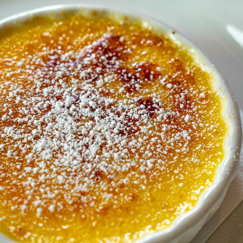 Made-from-scratch cr&egrave;me br&uuml;l&eacute;e dessert at Lisabella's Bistro