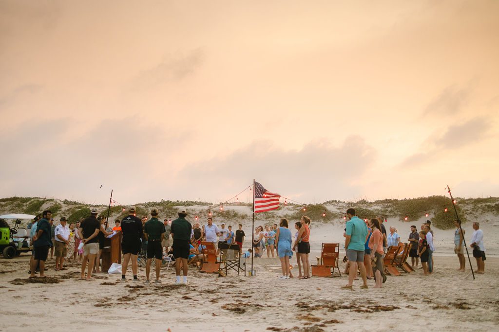 Memorial Day beach gathering at sunset at Cinnamon Shore in Port Aransas
