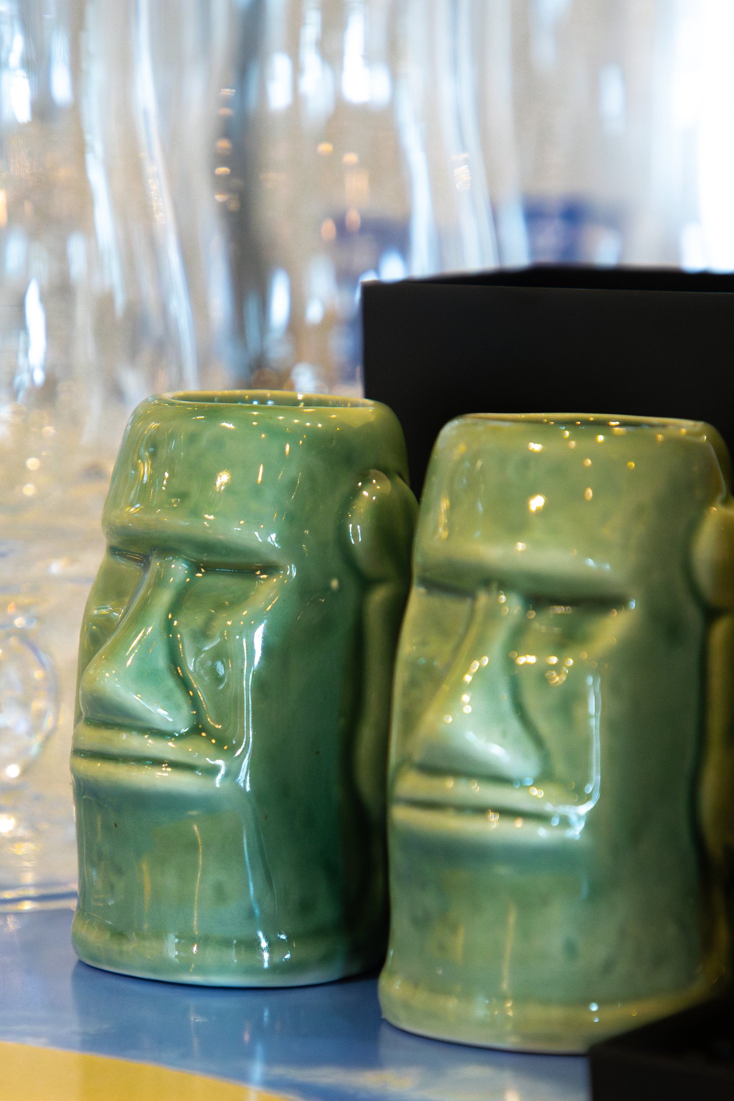 Green tiki mugs for Tiki Jay's handcrafted cocktails at Cinnamon Shore in Port Aransas