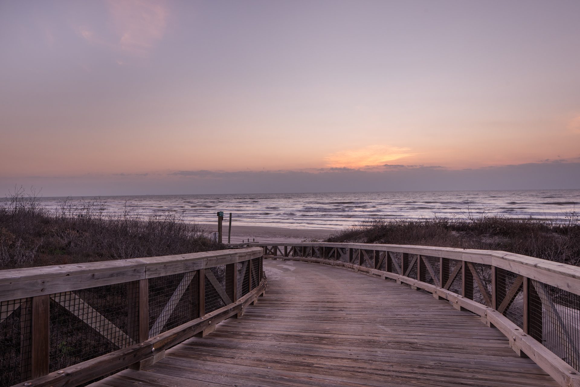 Beach boardwalk leading to the Gulf at Cinnamon Shore in Port Aransas