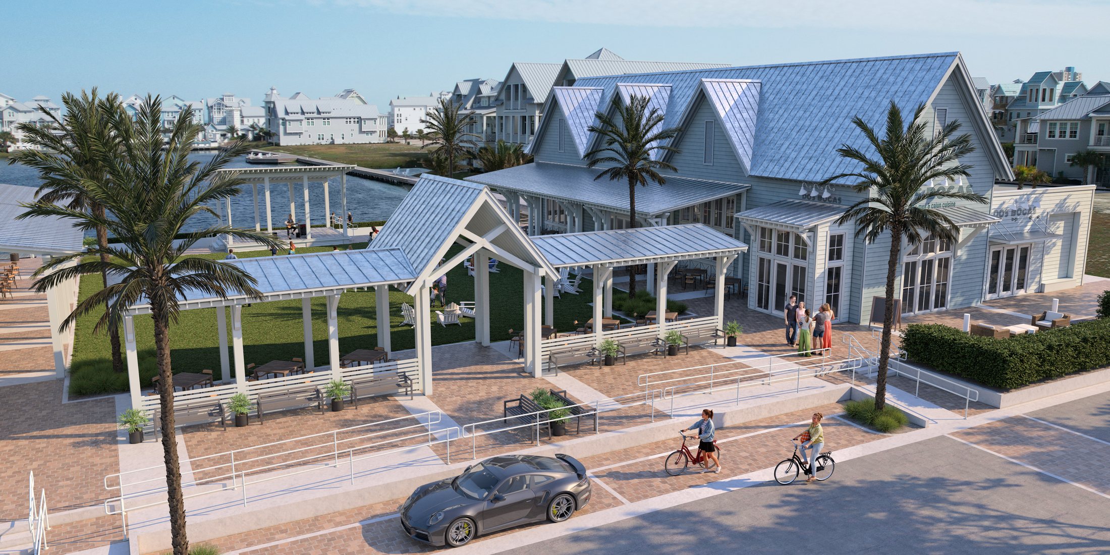 Conceptual rendering of South Town Square at Cinnamon Shore South in Port Aransas, Texas, with the Dos Bocas restaurant and a green gathering lawn on South Town Lake