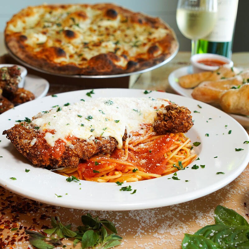 Chicken parmesan over spaghetti served with marinara and melted mozzarella at Dylan's