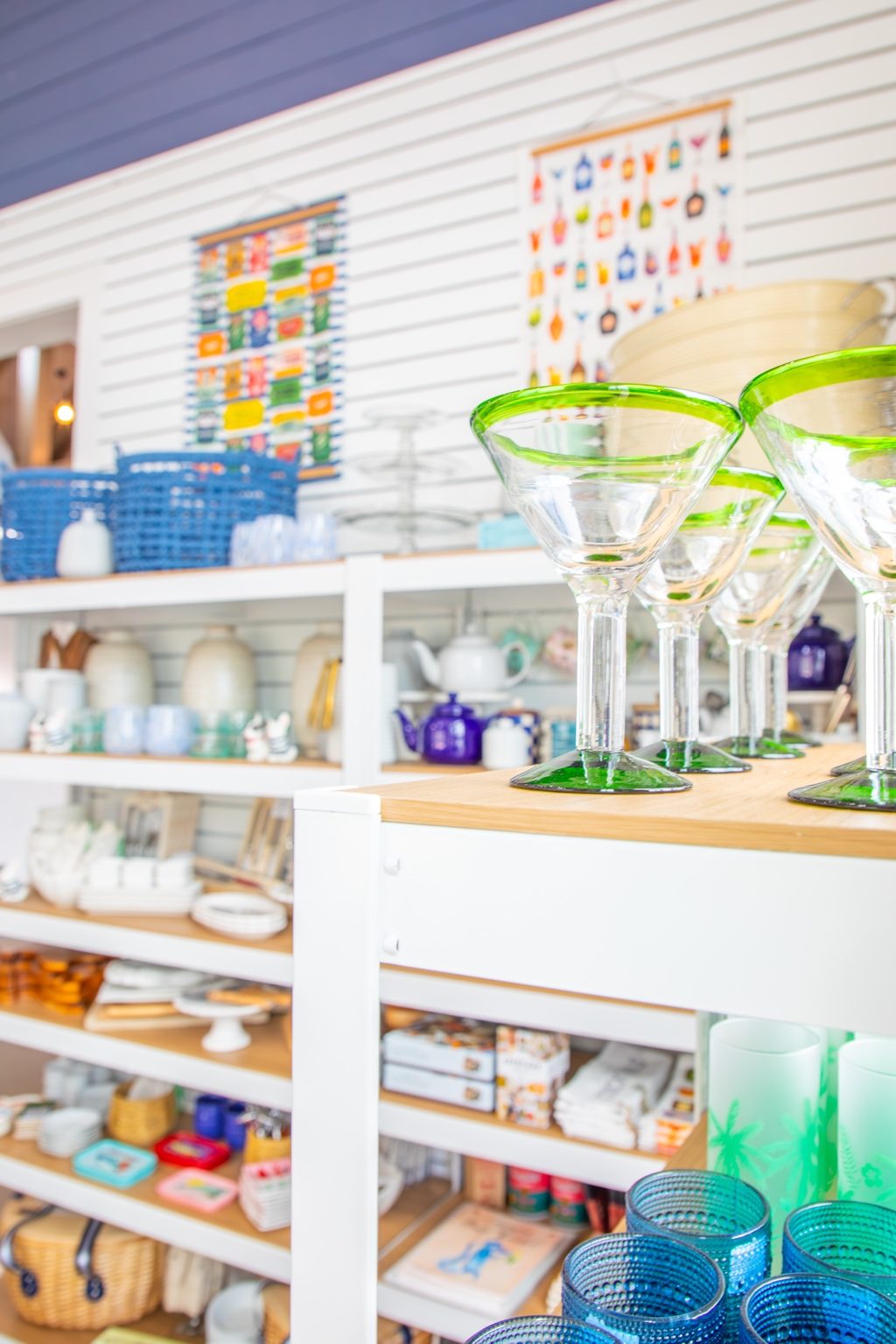 Colorful glassware and coastal gifts inside Saltwater Gypsies Market