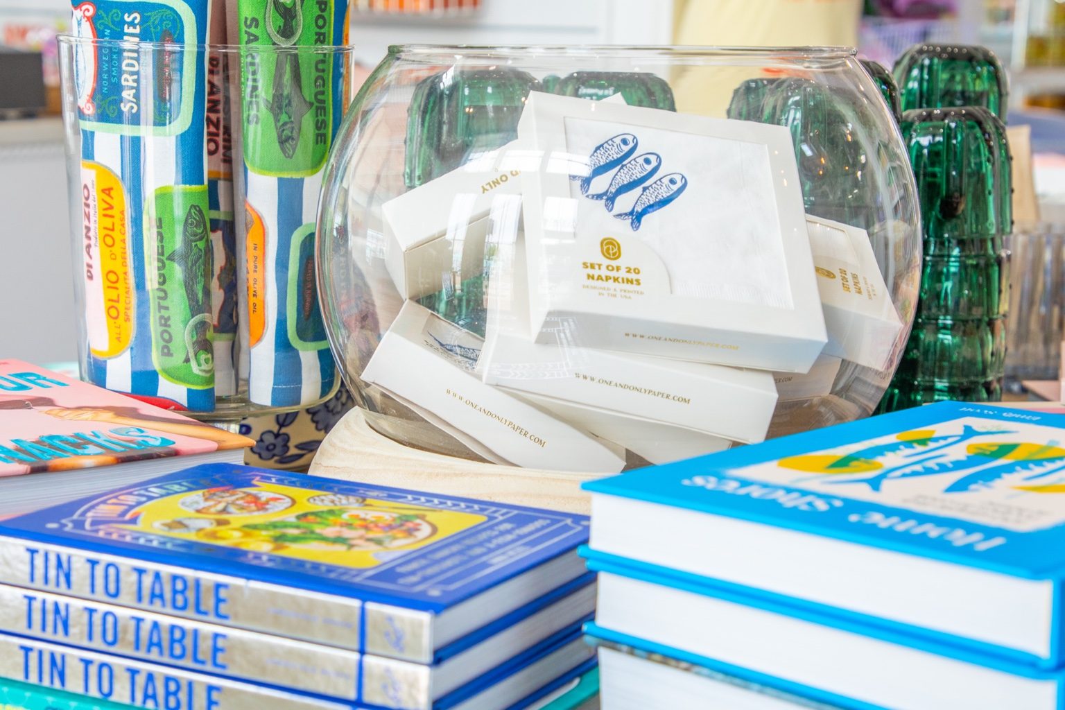 Cookbooks, napkins, and colorful kitchen gifts at Saltwater Gypsies Market at Cinnamon Shore