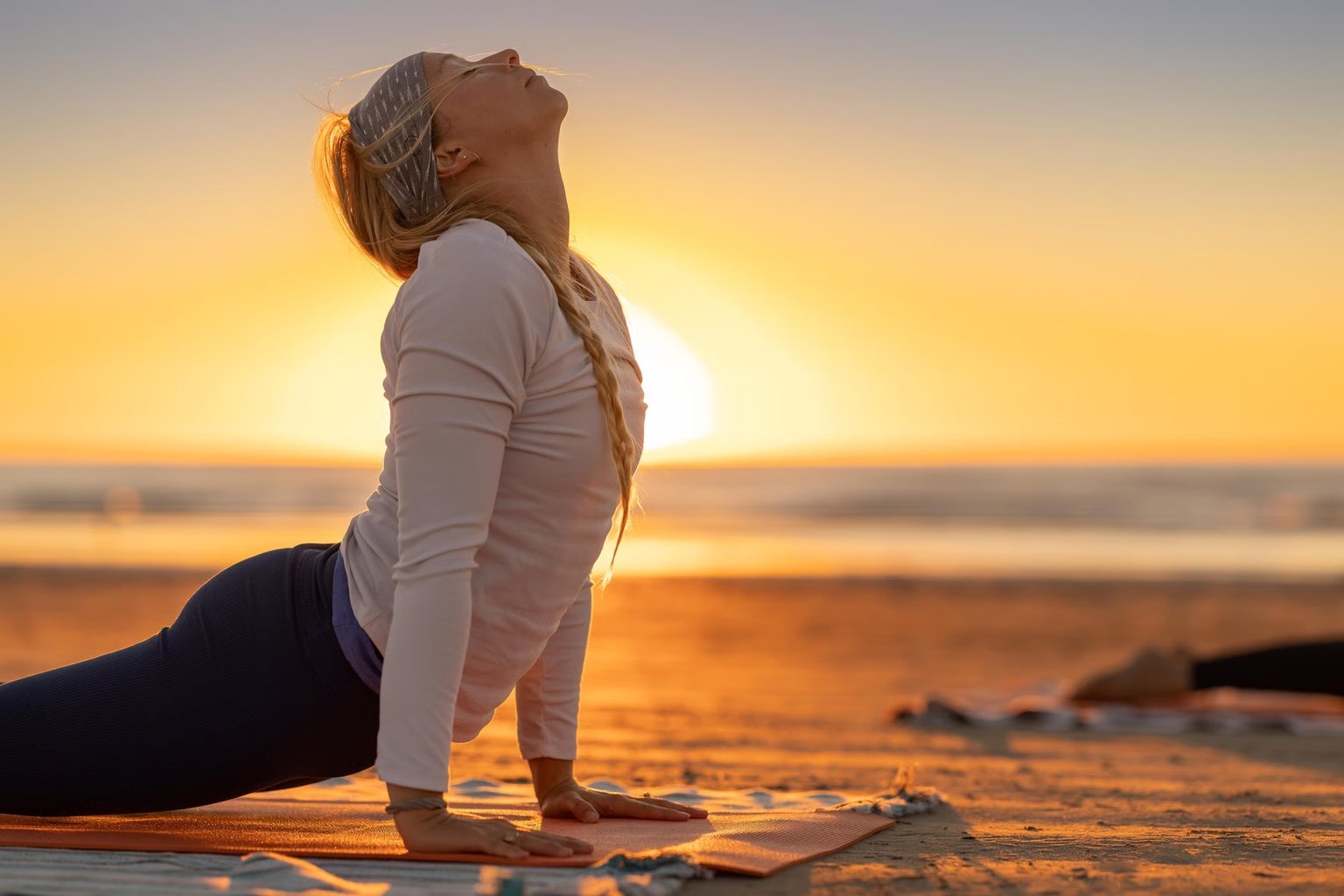 Sunrise beach yoga class on the sand at Cinnamon Shore in Port Aransas