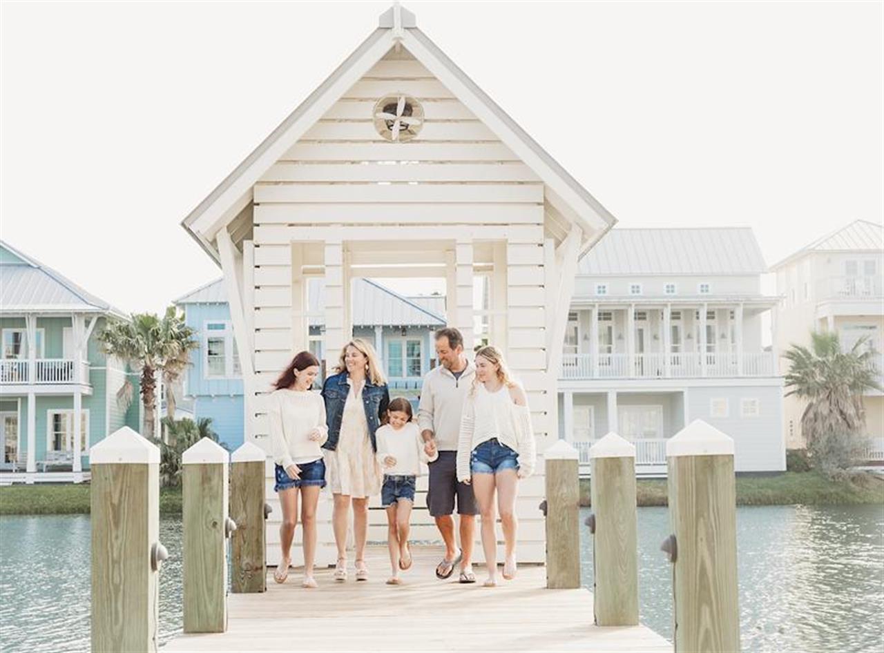 family at fishing pavilion