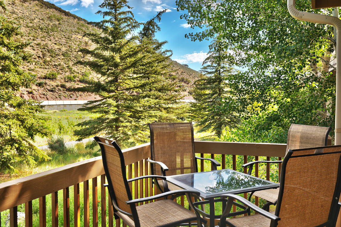 Park City Lodging's three-level townhome vacation rental property with a private patio overlooking the mountains.