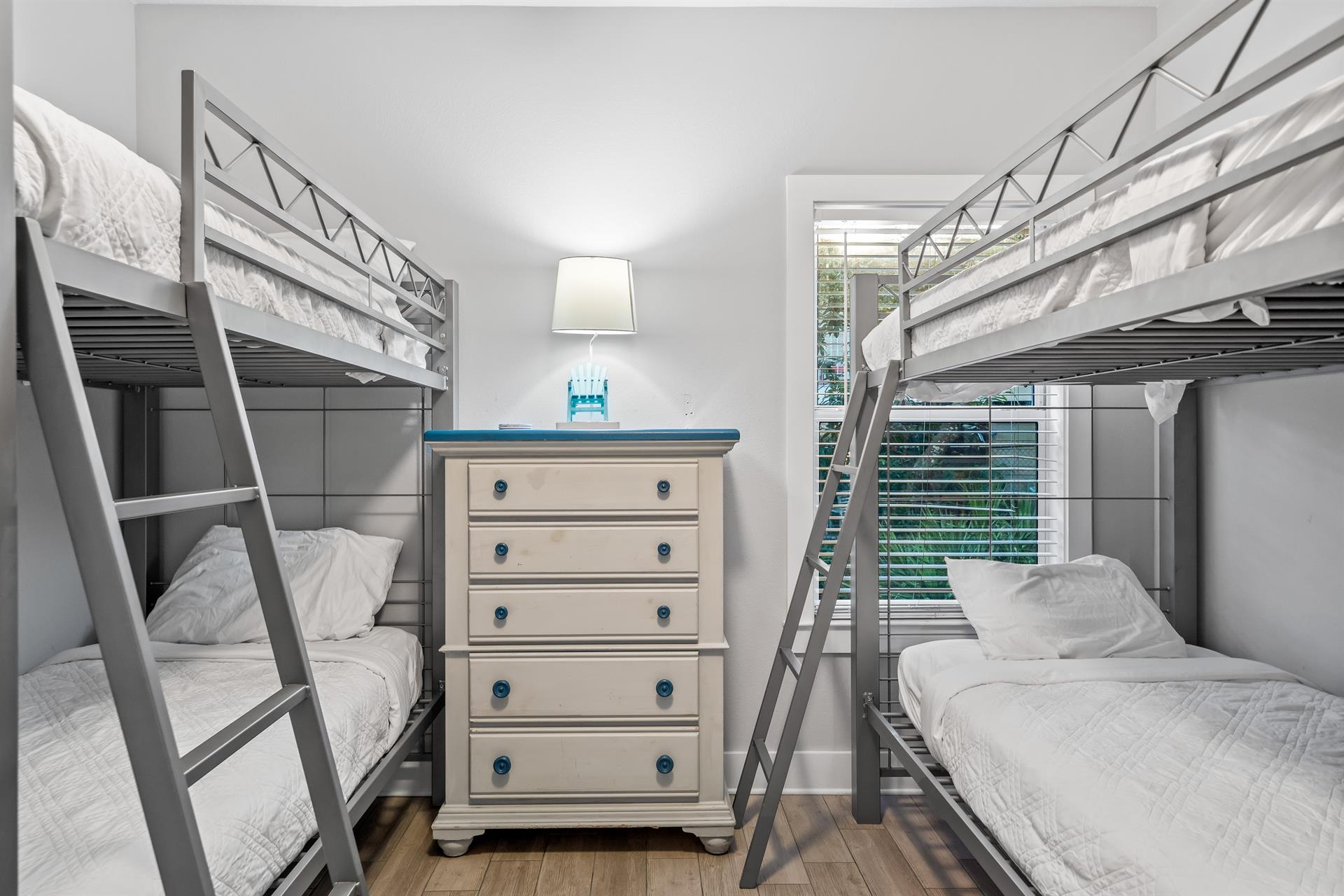 First floor bunk bedroom with 2 sets of twin over twin beds  a 31 tv with cable.