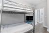 First floor bunk bedroom with 2 sets of twin over twin beds  a 31 tv with cable.
