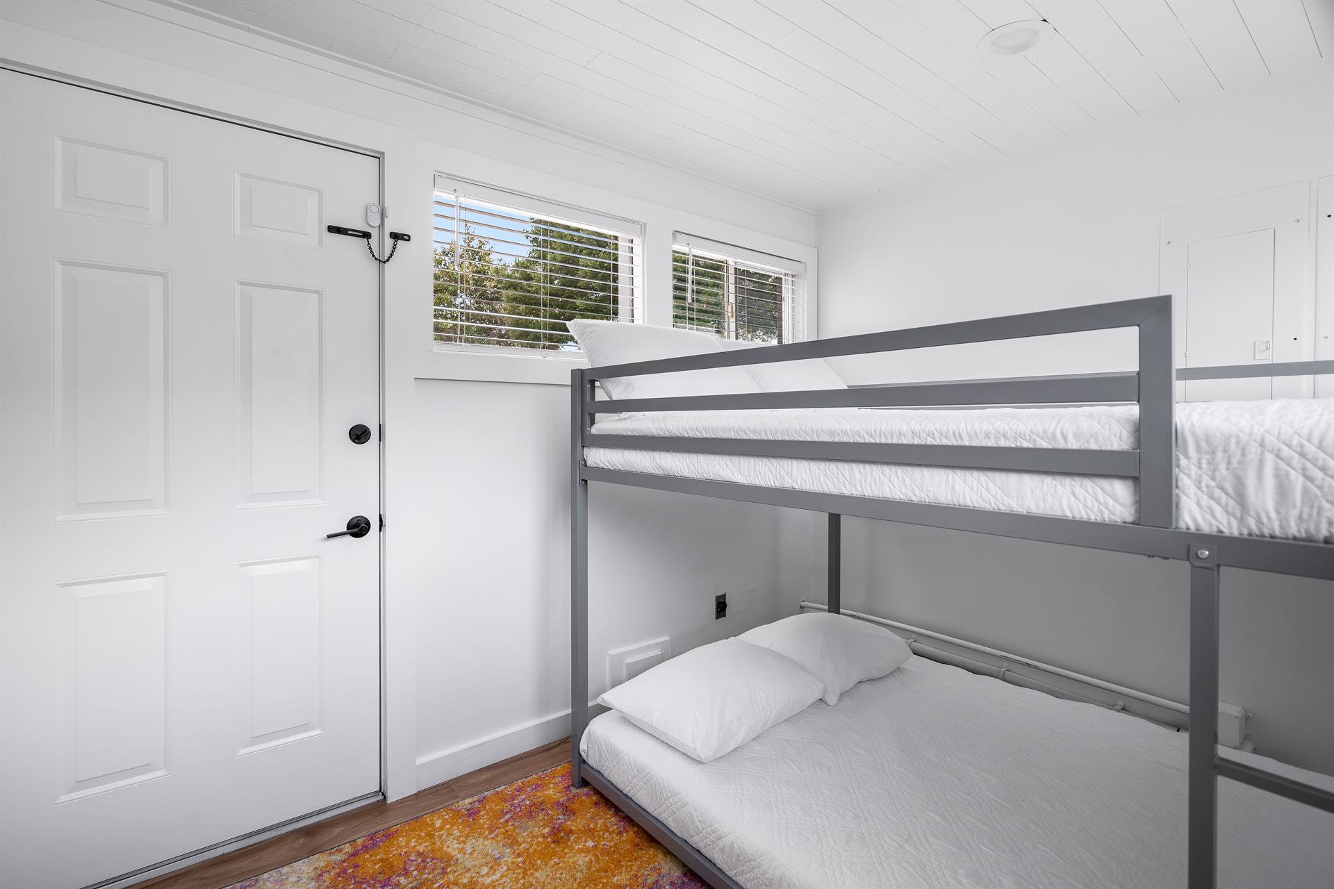 Childrens full over full bunk room nook just off of the en suite primary bathroom. Bedroom 2