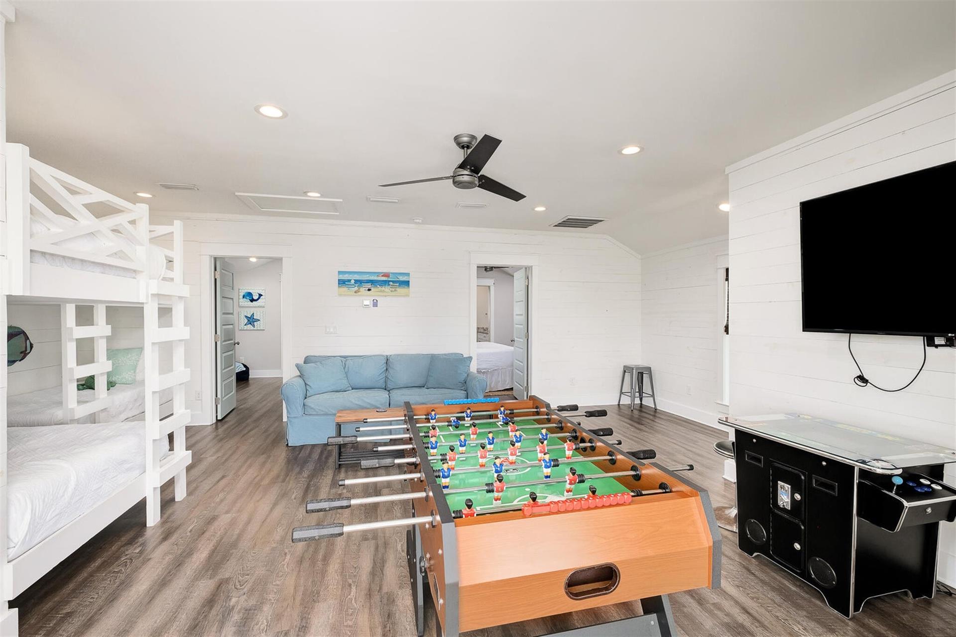 3rd Floor Loft Area, Queen Sleeper Sofa, Flat Screen Television, Foosball Table, Game Console Featuring Galaga, Donkey Kong and more