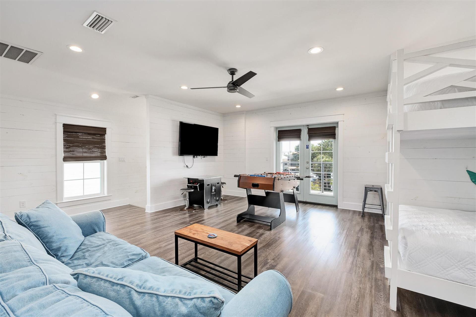 3rd Floor Loft Area, Queen Sleeper Sofa, Flat Screen Television, Foosball Table, Game Console Featuring Galaga, Donkey Kong and more