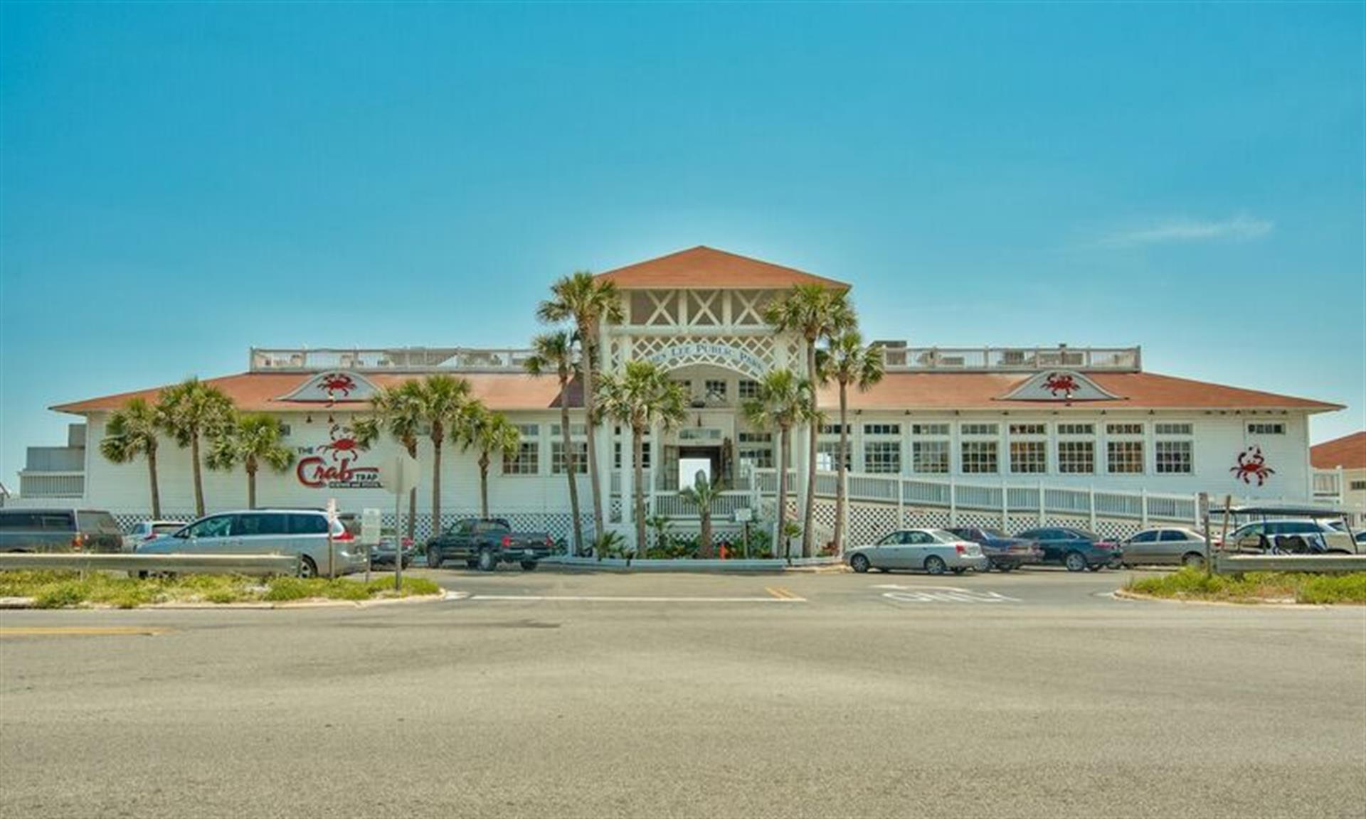 Drive the golf cart to the Crab Trap Beach Front Restaurant