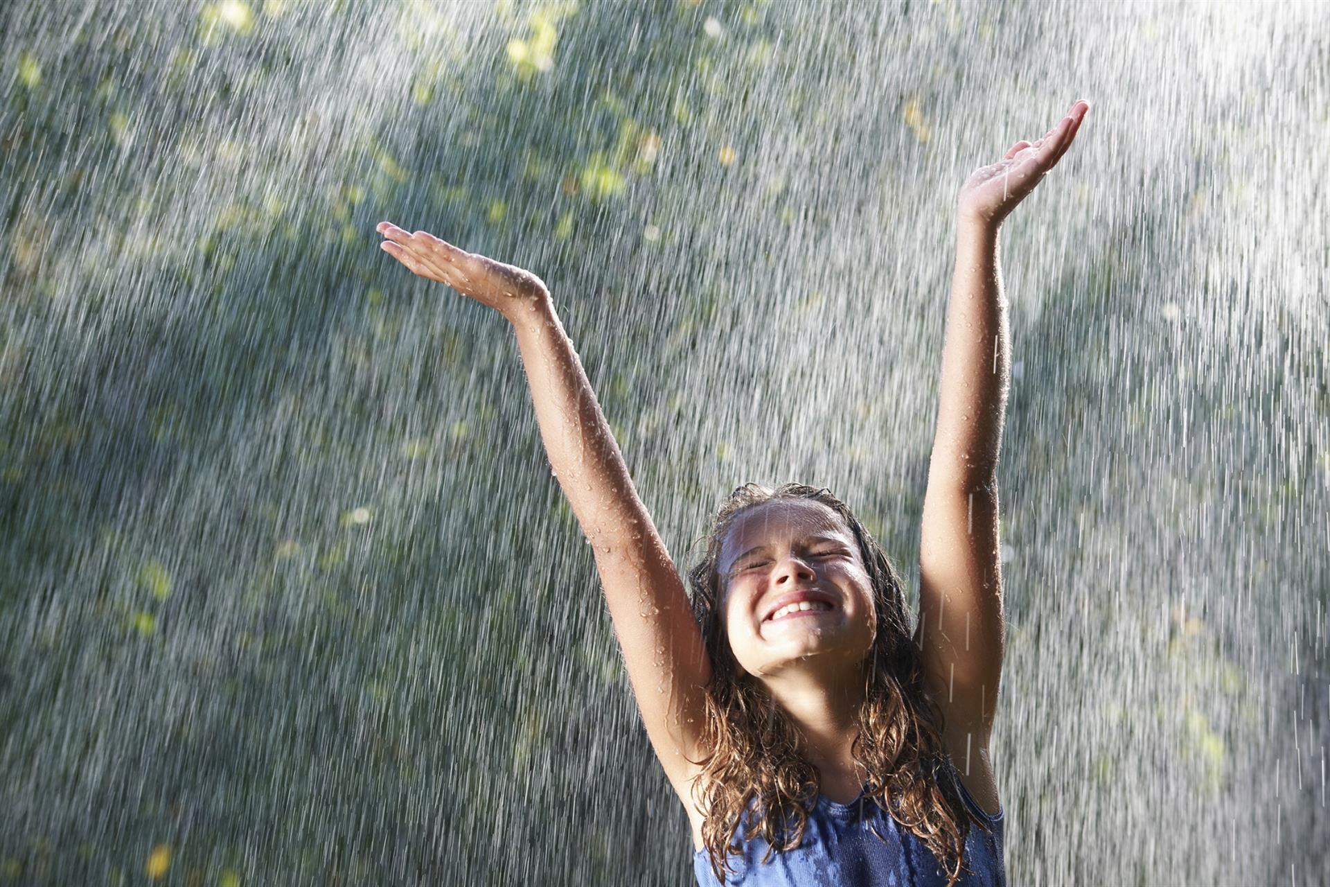 Girl playing in rain