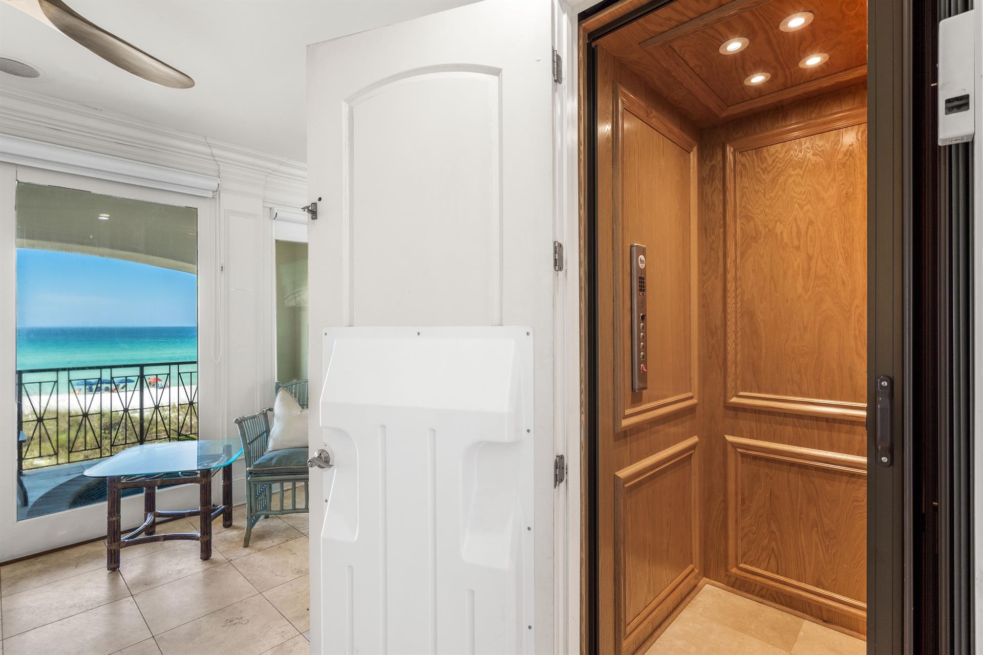 1st Floor King Bedroom, Elevator Access, Full Bathroom and Balcony Access