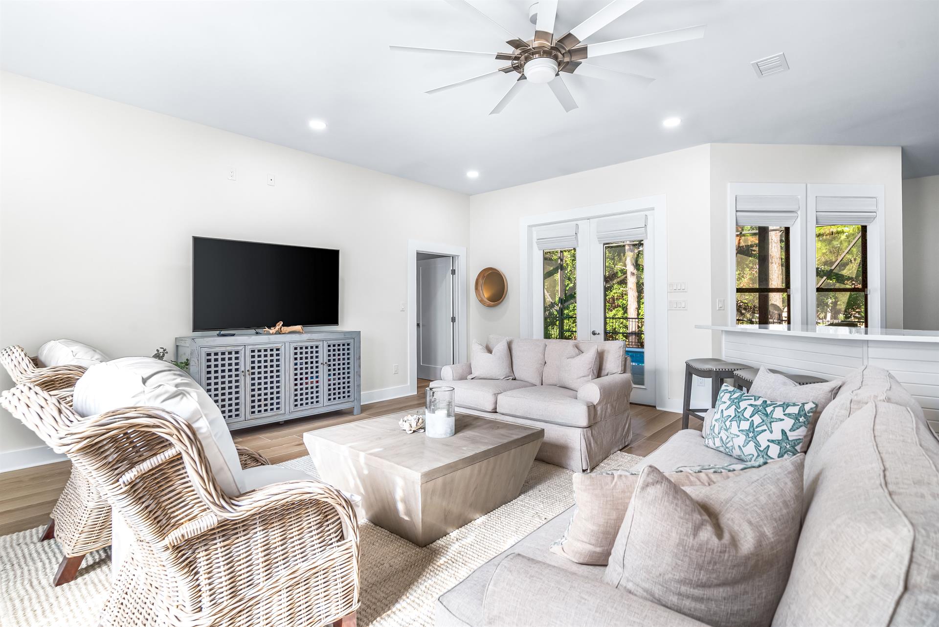 Main House Living Room and Island Bar with A 70 Smart TV with Cable as well.