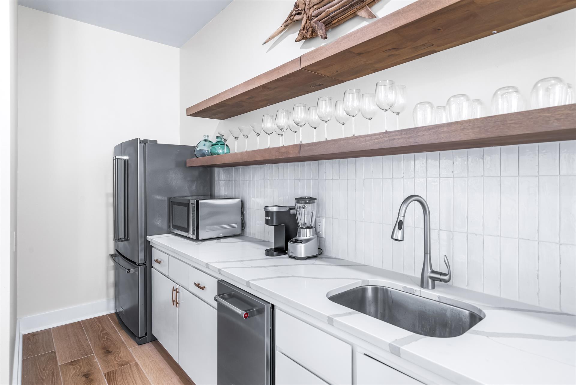 Full Size Living Room Bar with a Second Full Size Refrigerator and Free Standing Ice Maker and Wine Cooler, Microwave, Keurig and Blender With Seating for 4 More