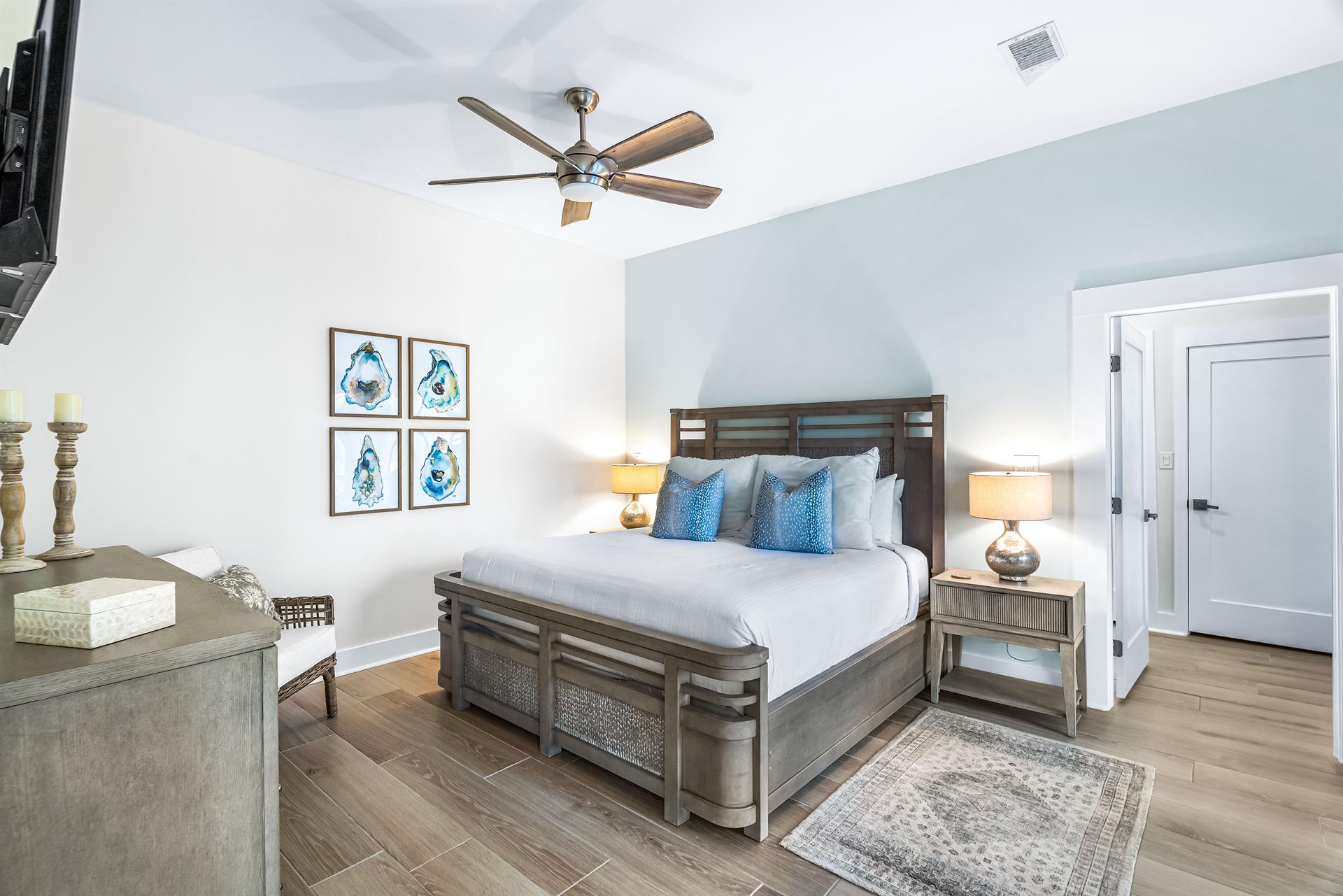 King Bedroom with Ensuite Bath with A 65 Smart TV and Cable.