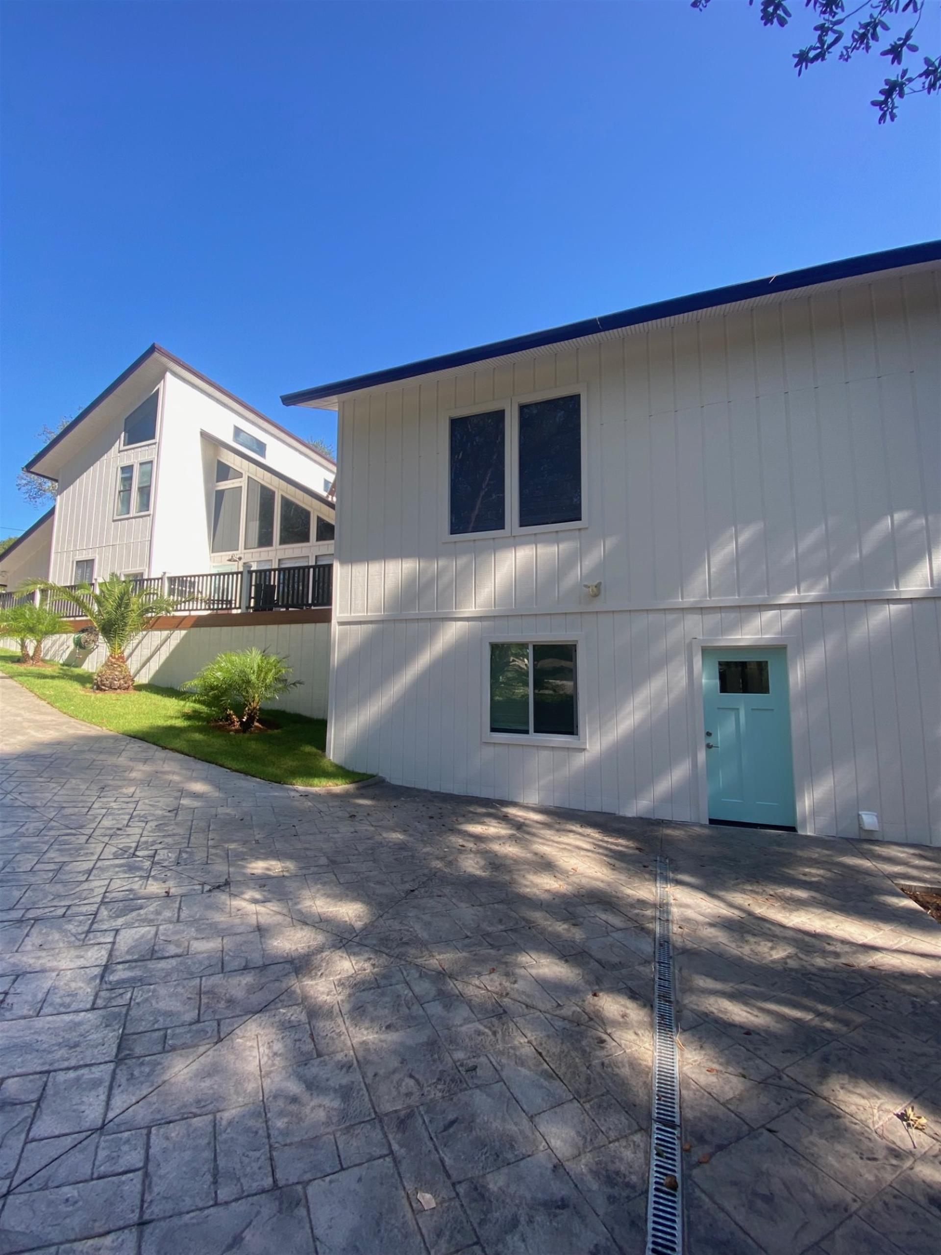 Attached In Law Suite entrance with a  King bedroom and Ensuite bathroom and a Double Bunkroom 4 Full Beds with Ensuite Bathroom