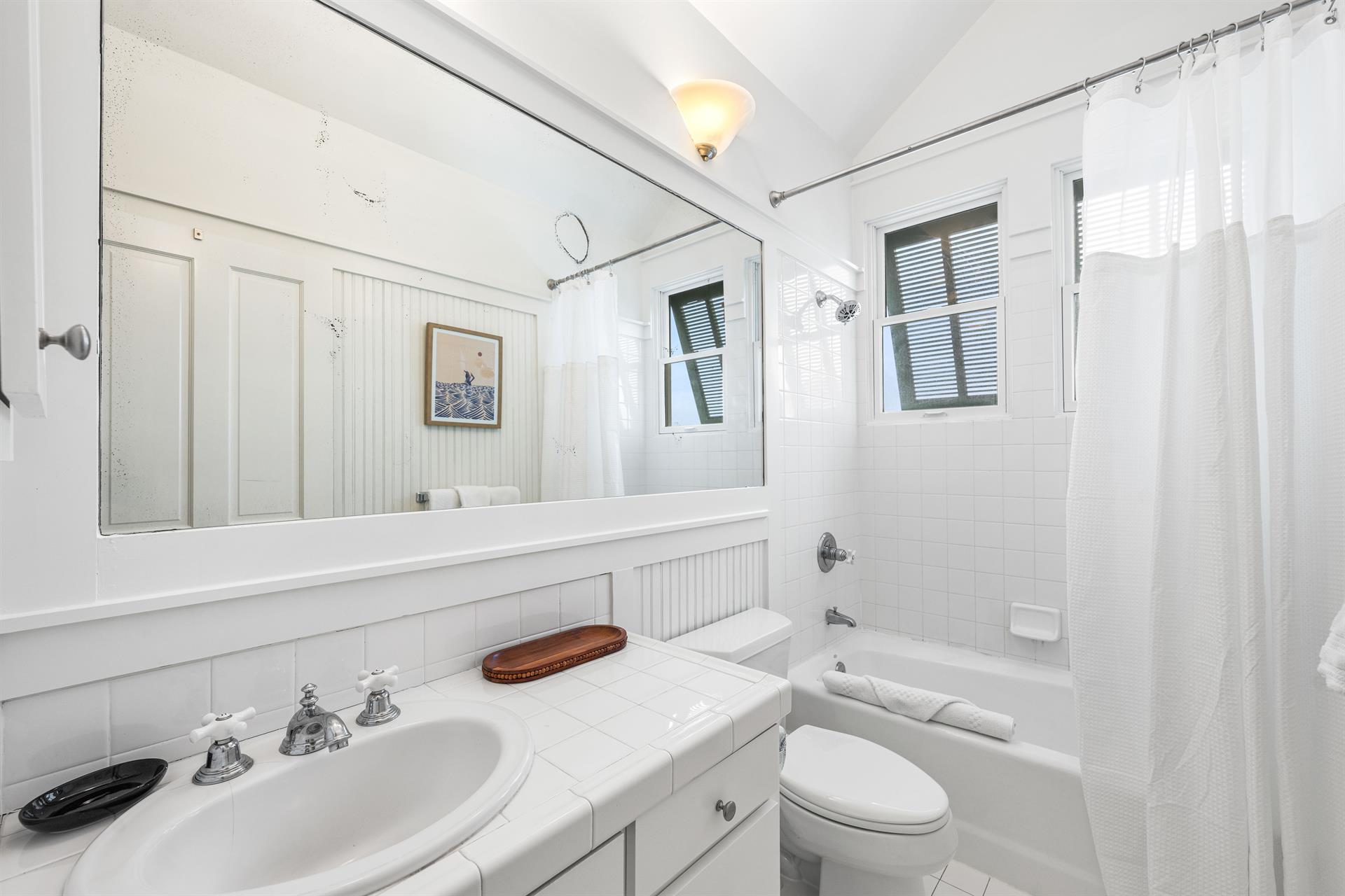 3rd Floor Full Bathroom with BathtubShower Combination.  Shared by Lofted Bedroom  King Bedroom on 3rd Floor.