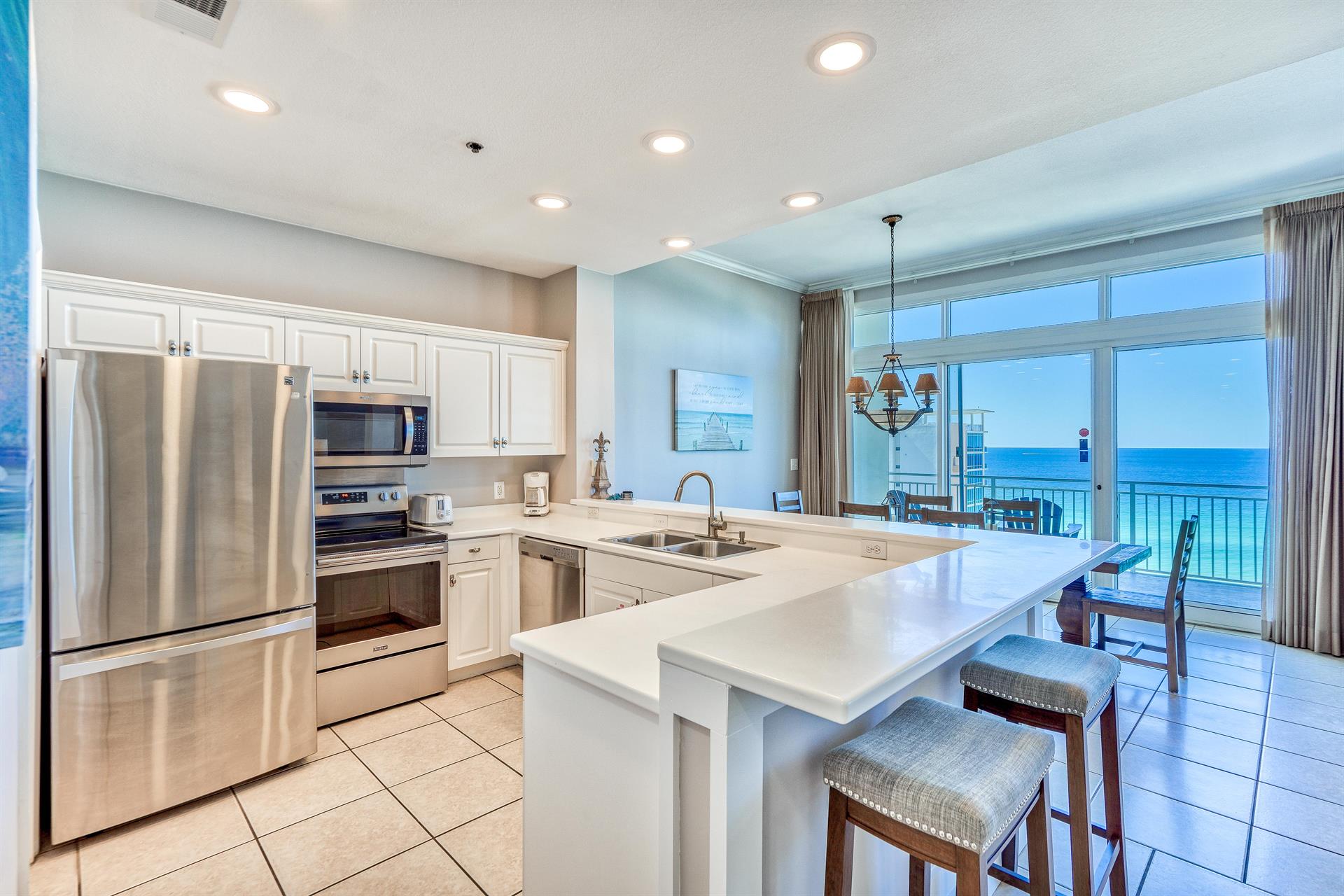 Fully Stocked Kitchen with Stainless Steel Appliances