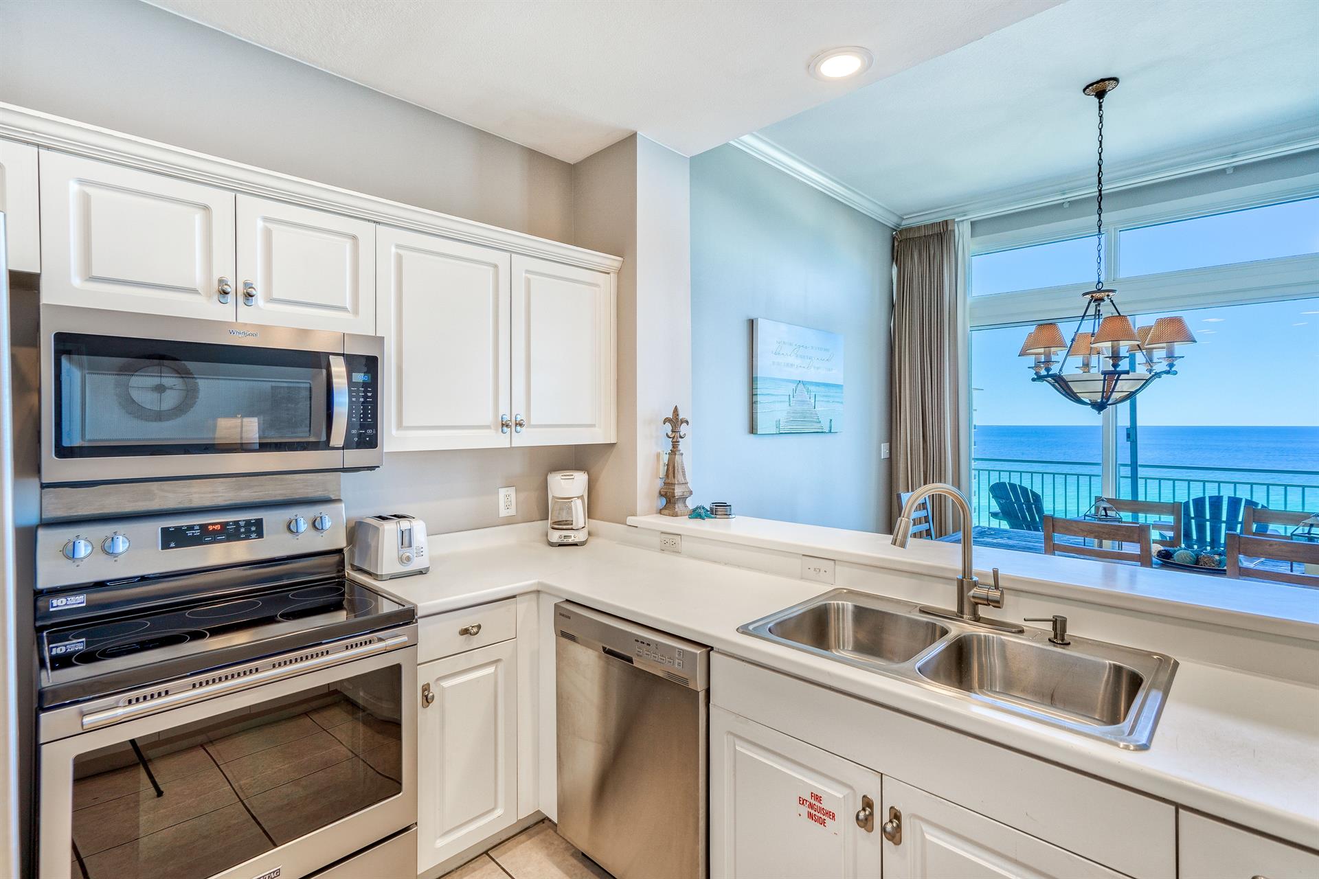 Fully Stocked Kitchen with Stainless Steel Appliances