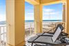 This 1st floor beachfront balcony with loungers has your name all over it